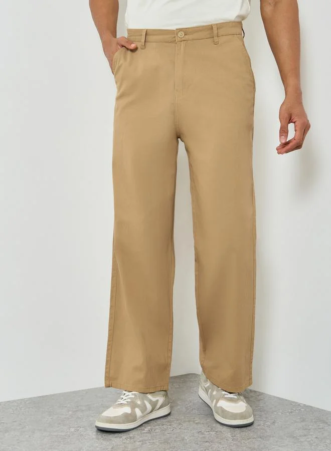 Styli beige Men Beige Wide Leg Trousers for Men | Best Price UAE